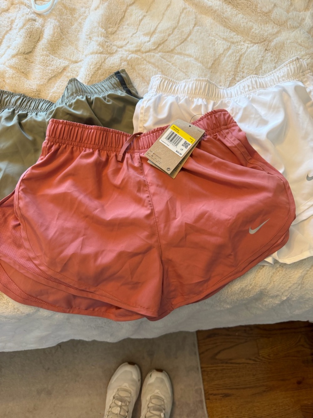 3 Nike Women's Dri-FIT Running Shorts - Rose, Olive and White. All size small.